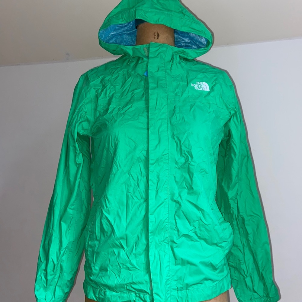 Rain coat with blue interior.